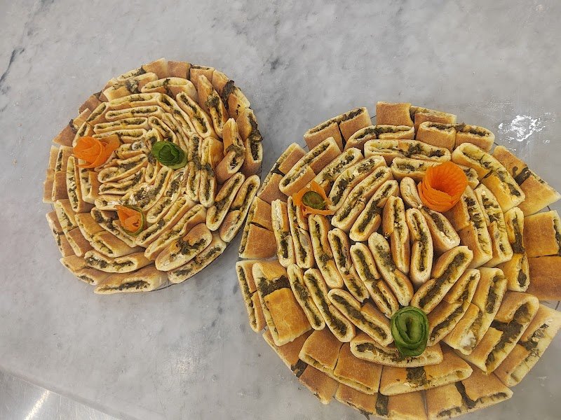 مطعم فرن الطابونة لتقديم الوجبات